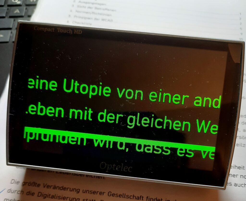 Elektronische Lupe mit Beispieltext